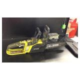 Ryobi battery operated chain saw with battery and