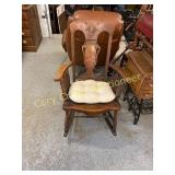 Antique rocking chair with leather seat