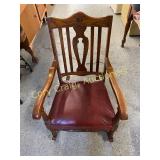 Antique rocker with leather seat
