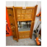 Wooden shelf with mirror, picture frames, hooks,