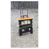 2 wheel hand truck and a saw horse