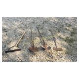Double sided axe, 2 shovels and a weed wacker
