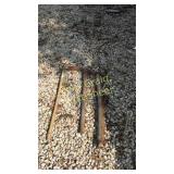 Single tree, pick axe, rake