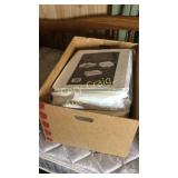 Box of quilted vinyl storage cases