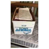 Box full of table cloths