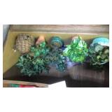 Shelf of artificial plants