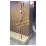 Santa and his elves going up the wooden ladder