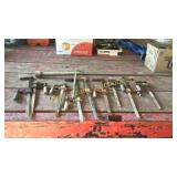 Assorted clamps and wrench