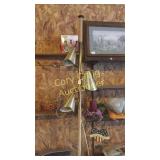 Spring pole wall lamp