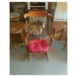 Wood rocker with red pad