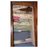 Closet of pillows and blankets