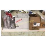 Cups, forks spoons knifes salt and pepper packets