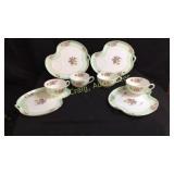 Noritake set of (4) luncheon places with cups.