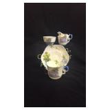 4 piece set,cup, saucer, sugar and creamer,