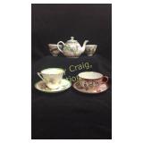 Small teapot with (2) glasses marked CHINA, (1)