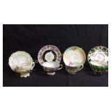 Misc cups and saucers. (1) Soft green and ivory,