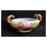 Hand painted small bowl with heavy gold handles,