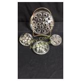 (4) Clear glass flower frogs, assorted sizes from