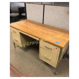 Small metal desk with drawers