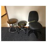 Pair of stools on casters and office chair on cast