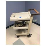 Cart on casters with 2 shelves