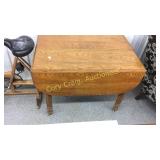 Oak Drop Leaf Table with Porcelain Wheels