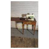 Singer Sewing Machine w/ Cabinet