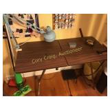 Fold-up sewing machine table with clamp on lamp