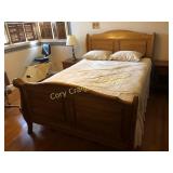 Oak sleigh style queen size bed, with like new
