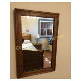 Wall mirror in oak frame