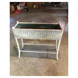 Antique wicker planter
