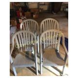 (4) plastic patio chairs