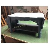 Painted table with drop leaf on 1 end and magazine