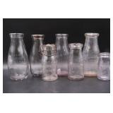 Antique Embossed Dairy Bottles