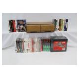 Mostly unopened VHS movies and storage case
