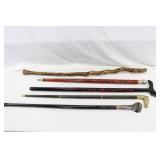 Walking stick and 4 canes