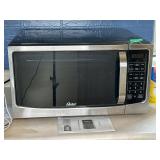 Oster 1.6 cu ft Countertop Microwave SS