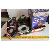 Partial box of bags,ext cord ,tank heater,timer