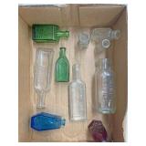 Miniature glass bottles