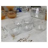Five small Pyrex bowls