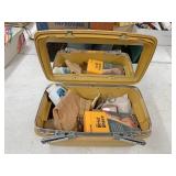 First aid box with several braces scissors and