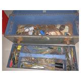 Metal toolbox with TV repair supplies