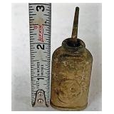 Very small oil can