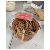 Basket full of clothes pins