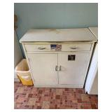 Metal counter with two doors contents included