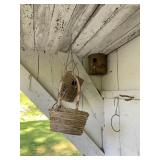 Homemade bird houses in basket