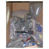 Box full of Volvo seatbelts part number 394-8253