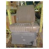 Brown semi seat with fiberglass bottom