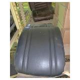 Two black seat tops for semi seats