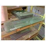 Two pieces of green tempered glass